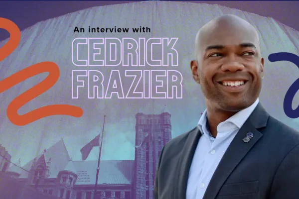 An interview with Cedrick Frazier, candidate for Hennepin County attorney - in the graphic, he is placed in front of Minneapolis City Hall.