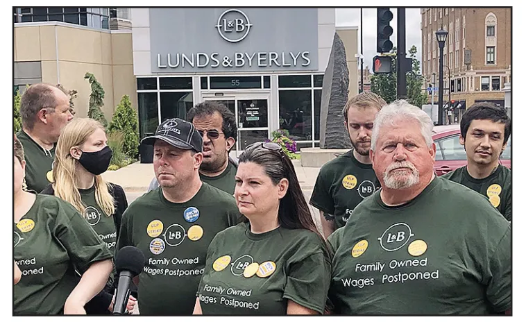 June 26: Outside the Lunds & Bylerlys in northeast Minneapolis, UFCW Local 663 members prepared to speak at a news conference to announce a three-day Unfair Labor Practice strike. The two sides reached a tentative agreement later that night, averting a strike.