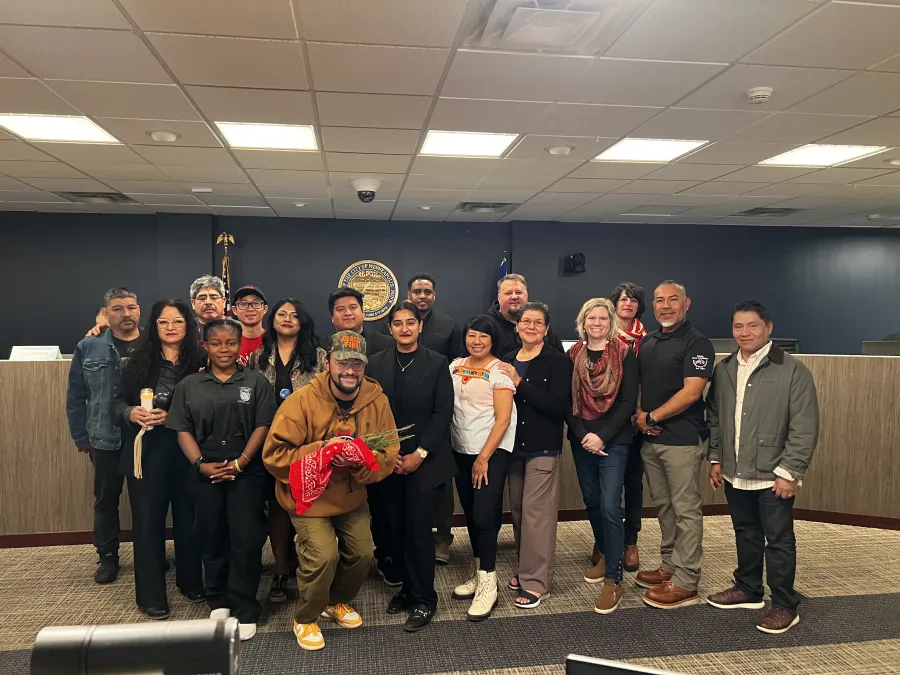 Members of the community, along with Councilmember Aurin Chowdhury (Ward 12), Councilmember Aisha Chughtai (Ward 10) and Councilmember Jason Chavez (Ward 9) stand alongside Chelsie Glaubitz (MRLF President) and Alfreda D. Juasemai (Executive Campaign Manager) in the Council chambers.