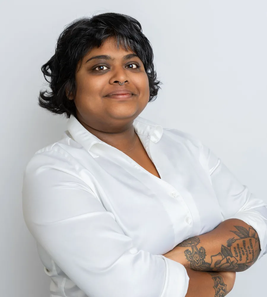 Photo of Stacie Balkaran (they/them)