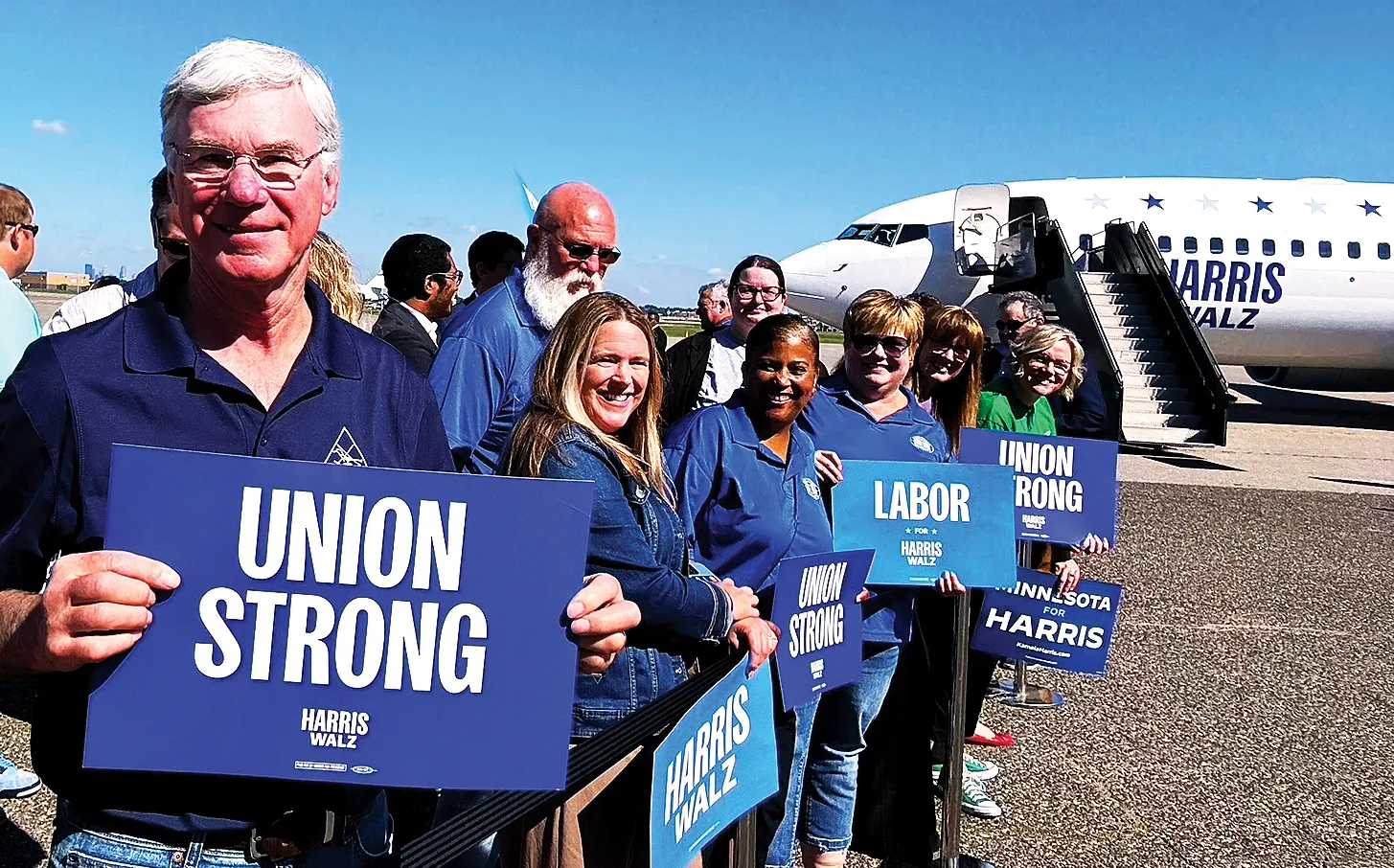 Union leaders greet Walz at airport